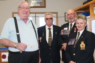 Jim Smith (l) received his 50-year ordinary member pin from President Alden McLellan, Zone Commander Ty Seeley and Patty Middleton, honours and awards chair as the Sharbot Lake Legion held its Honours and Awards and Volunteer Appreciation Banquet Saturday. Photo/Craig Bakay